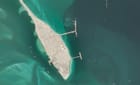 Two tugs assist a tanker alongside the pier at Ras Tanura (Copernicus / Sentinel-2)