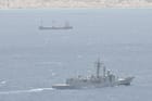 warship monitoring hijacked vessel
