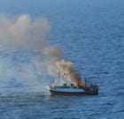 burning fishing boat