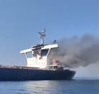 bulker on fire after being struck by projectiles