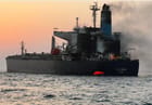 evacuation of burning tanker in Strait of Hormuz