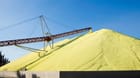 A stockpile of raw elemental sulfur at a refinery (P. Wei / iStock)