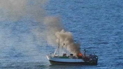 burning fishing boat