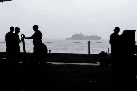 Crew of USS Abraham Lincoln conduct underway replenishment, August 16 (USN)