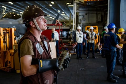 Seaman Bailey Szramowski during an UNREPS evolution aboard USS Abraham Lincoln, 2022, several months before the events in the case (USN)