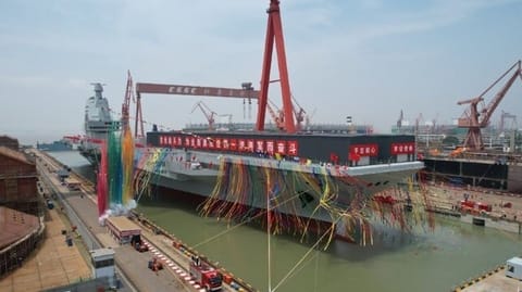 The numbers exclude warship orders at the same yards (PLA Navy file image)