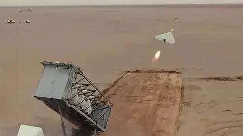 An Iranian Shahed drone launches from a multi-pack rack (IRGC file image)