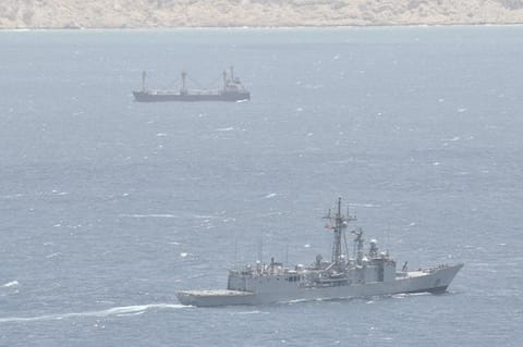 warship monitoring hijacked vessel