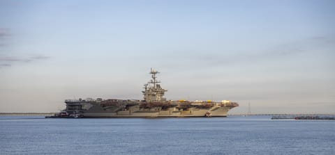 carrier moving to shipyard for overhaul