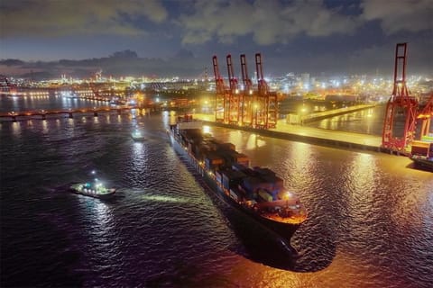 containership departing China for Arctic transit