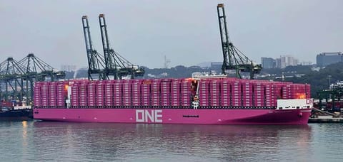 giant containership loaded with record 22,000 boxes