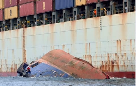 capsized tugboat