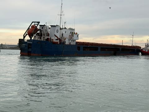 vessel damaged in attack towed to port