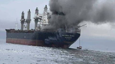 ship burning in the Strait of Hormuz after attack