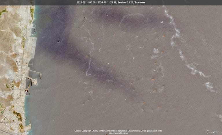 Throngs of ships at anchor off Fujairah, July 2026 (Sentinel-2 / ESA)