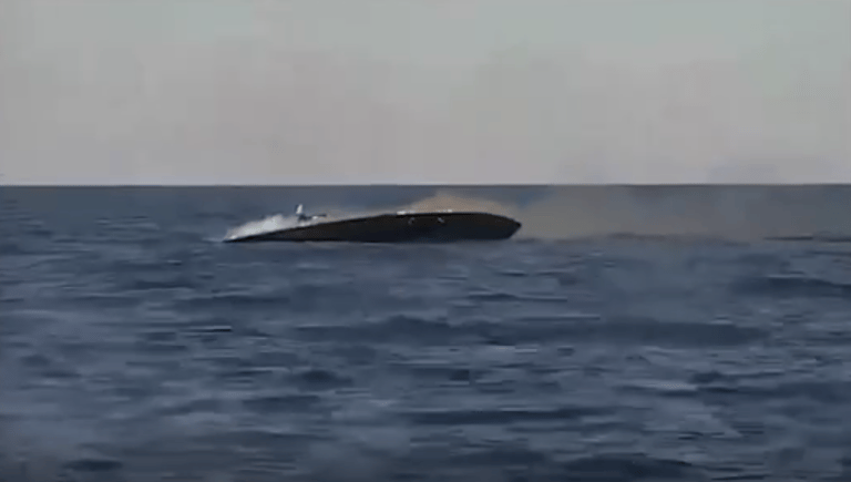 The damaged Russian drone boat lists to port and begins to sink by the stern (Ukrainian Navy)
