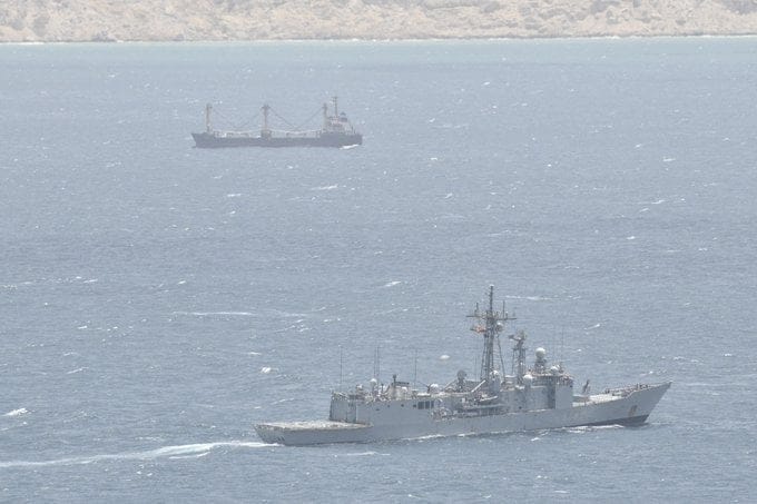 warship monitoring hijacked vessel