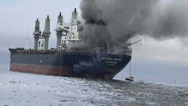ship burning in the Strait of Hormuz after attack