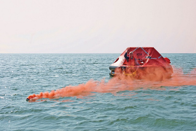 https://maritime-executive.com/media/images/Drew%20Marine%20Lifesmoke-Liferaft.jpg