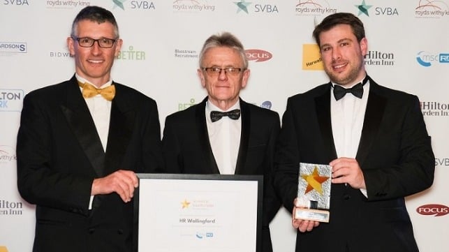 Simon Tiedeman, Business Manager (left) and Peter Watchorn, Senior Surveyor (right) receive the award from Iain Gray, Business and Growth Partnership Manager at MSC R&D. Picture: Sam & Steve Photography