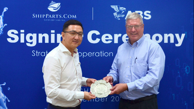 Mr. Eric Klees, Senior Vice President, Eastern Hemisphere Operations, ABS (pictured right) presenting memorabilia to Mr. David Luan, Founder and Chief Executive Officer, ShipParts.com (pictured left)