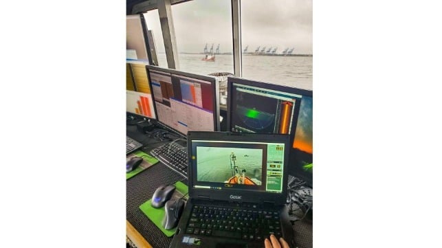 A view from the bridge of the mothership: An on-board operator sets the flanking offset distance of the daughter craft Sigsbee (shown) using the Sea Machines SM300 as it autonomously surveys Western Galveston Bay. Photo credit: DEA