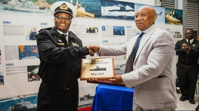 DSCT Board Member, Mr Sam Montsi, hands over a delivery token to Vice Admiral Mosuwa Samuel Hlongwane, Chief of South African Navy