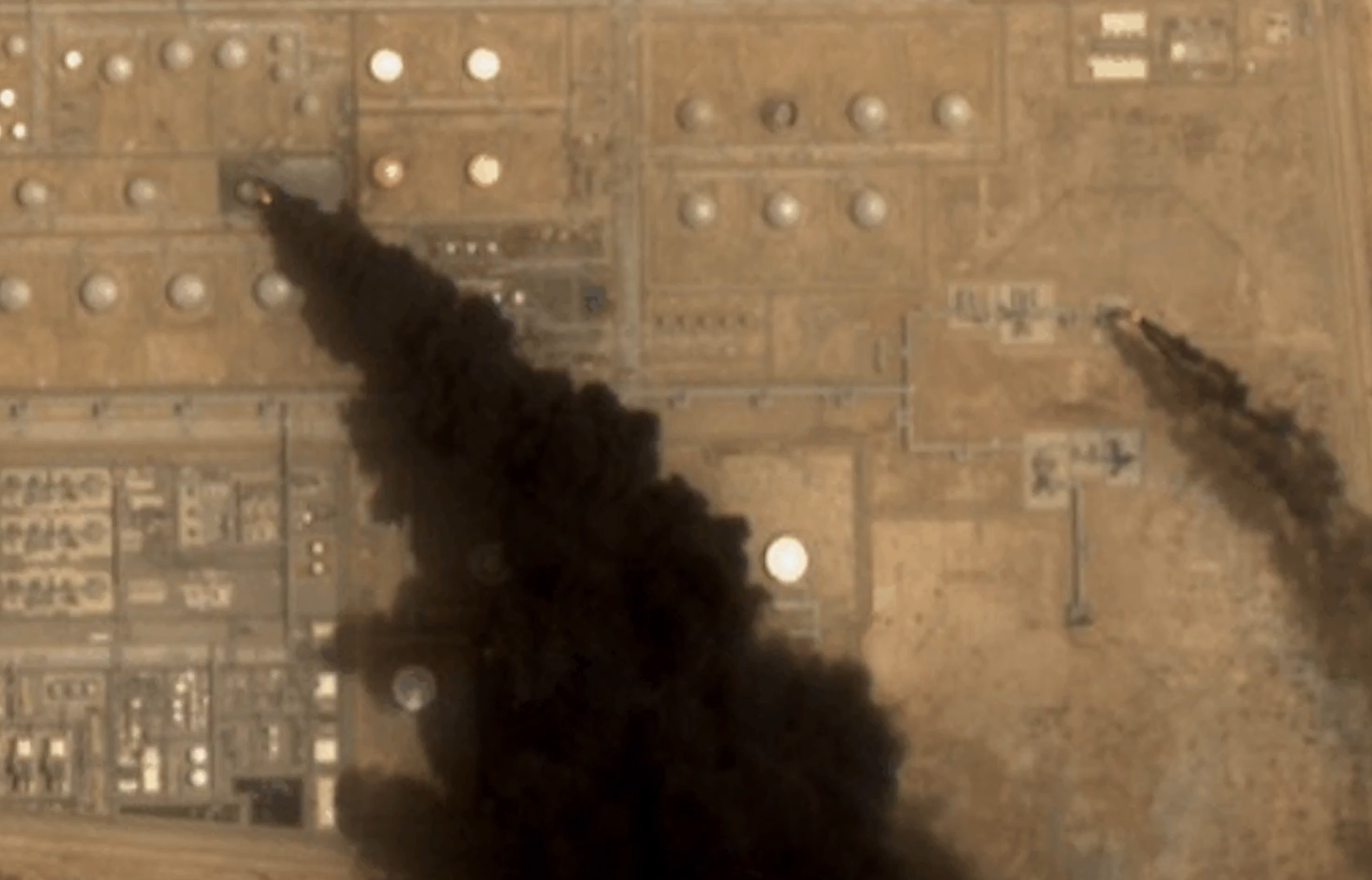 Smoke pours from a damaged storage tank after a Houthi strike on the Jizan refinery, upper left (Sentinel-2)