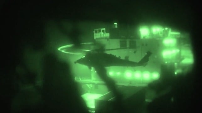 U.S. Marine Corps teams prepare to board the Iranian boxship Touska (U.S. Central Command)