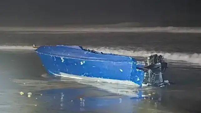 The panga on the shore at Imperial Beach, Nov. 14 (USCG)