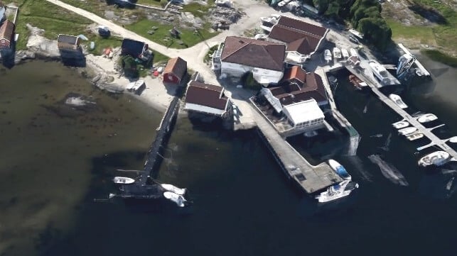 Ferry pier at Herfol, center right, and old post office, center (Google Maps / Airbus)