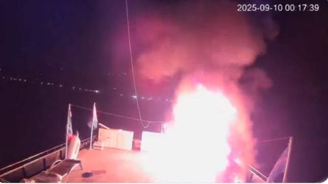 fire on deck of activist boat