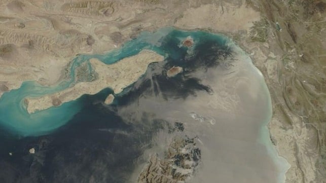Larak, center, sits just east of Qeshm at the apex of the strait (NASA Worldview)