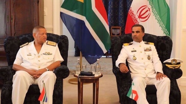 Vice Admiral Monde Lobese and Captain Emad Nejad Moridi, Commander Nedaja 103rd Flotilla discuss the week’s events (Press TV)