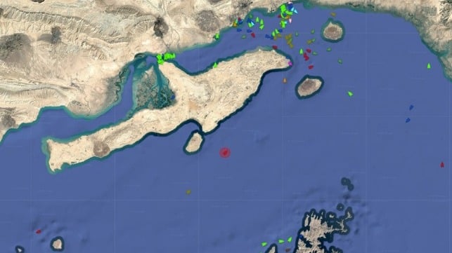 LPG tanker Gas Lucky (red, center) heads for Iran's checkpoint, broadcasting "China_Owner." Bulker Selen is just behind, broadcasting "Food for Pakistan." (Pole Star Global)