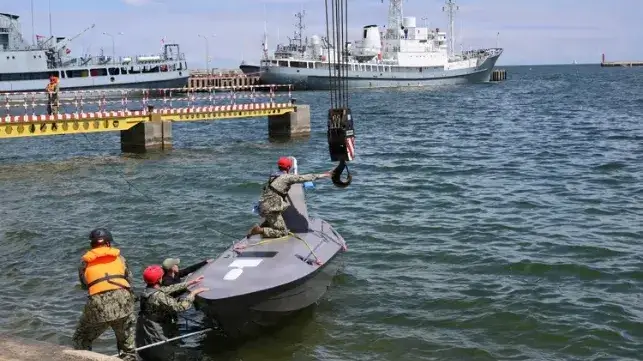 Navy personnel launch a drone boat in an exercise in Gdynia, Poland, June 2026 (USN)