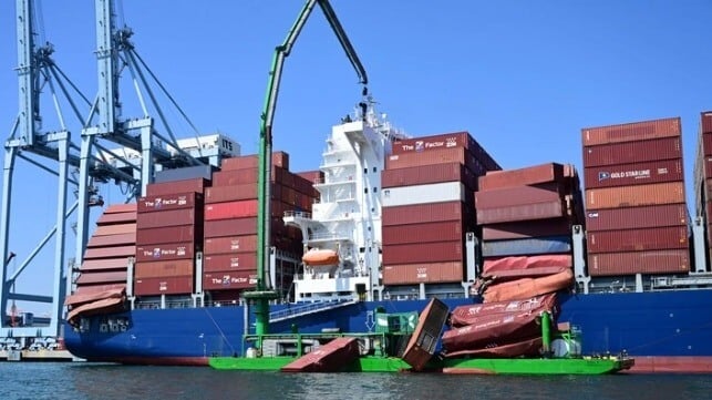 containers collapsed and landing on emission barge alongside