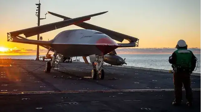 An MQ-25A with a refueling "buddy" pod, stowed for transit (Boeing)