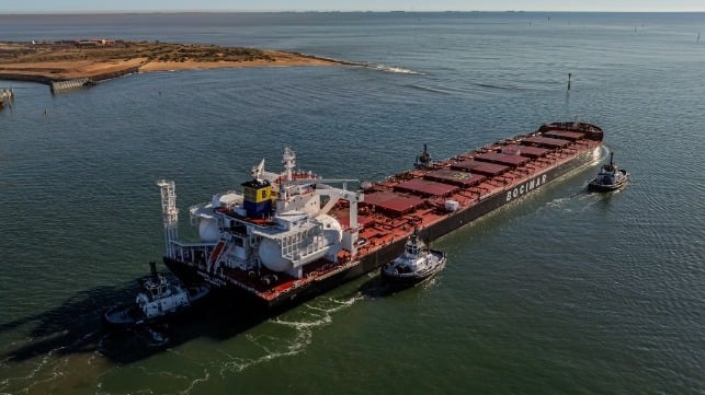 large bulker sailing from port
