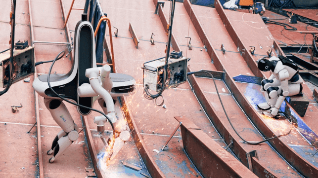 Self-mobile welding robots at work at HD Hyundai (HD Hyundai file image)