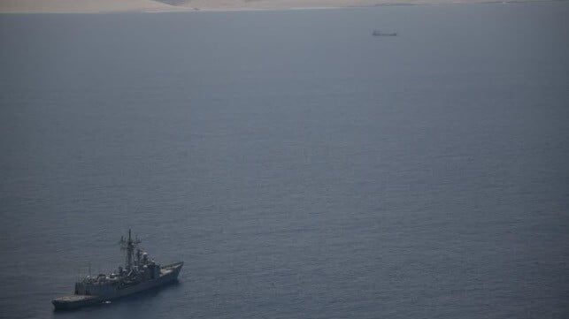 Op Atalanta frigate keeping an eye on a vessel seized by pirates off Puntland (Op Atalanta)