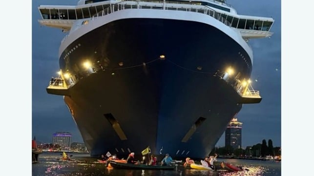 cruise ship and protestors