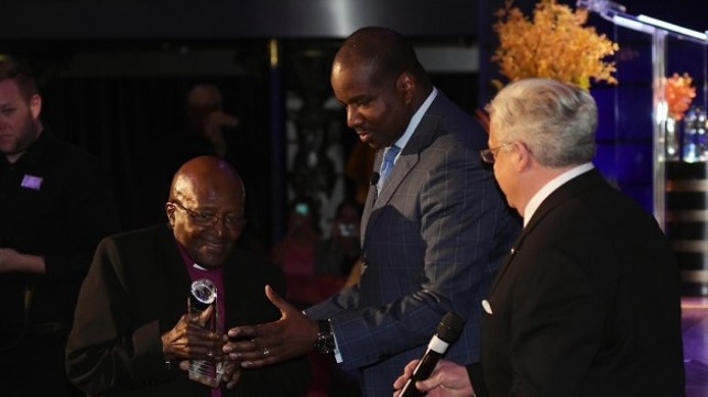Orlando Ashford presents the Shared Humanity Award to Desmond Tutu.