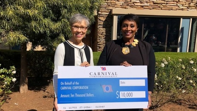 Rebecca Sykes, president of the Oprah Winfrey Charitable Foundation, (left) and Julia Brown, chief procurement officer for Carnival Corporation, (right).