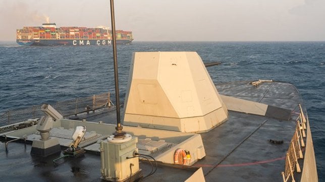 warship escorting containership in the Red Sea