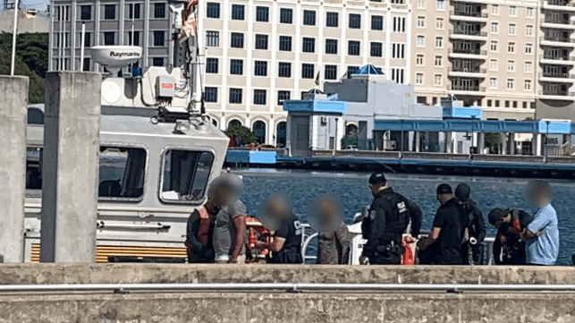 Boat crew intercepts and detains stowaways
