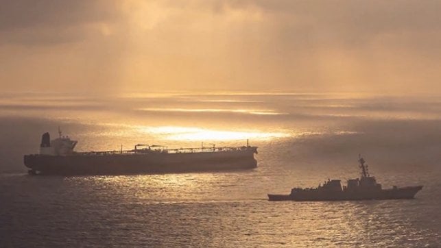 US warship monitoring tanker