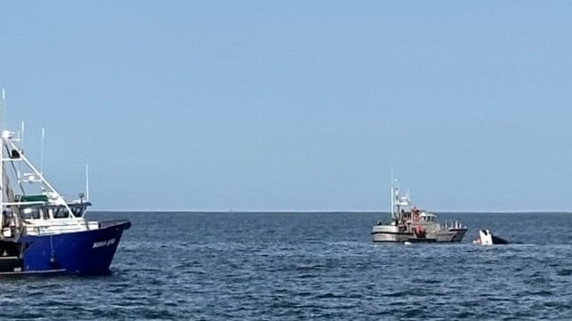 A Coast Guard surf boat responds to the scene of the sinking vessel (U.S. Coast Guard)