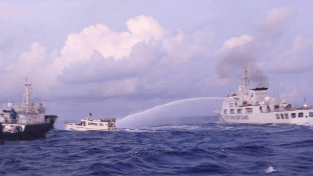 China Coast Guard cutter applies water cannon to a Philippine supply boat near Second Thomas Shoal, Dec. 10 (PCG)