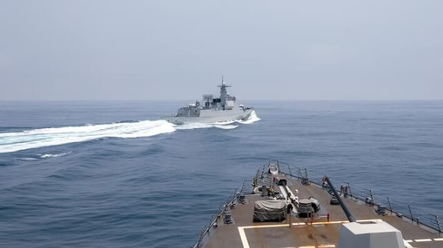 A Chinese warship cuts across the bow of a U.S. Navy destroyer in the Taiwan Strait, June 3 (USN)